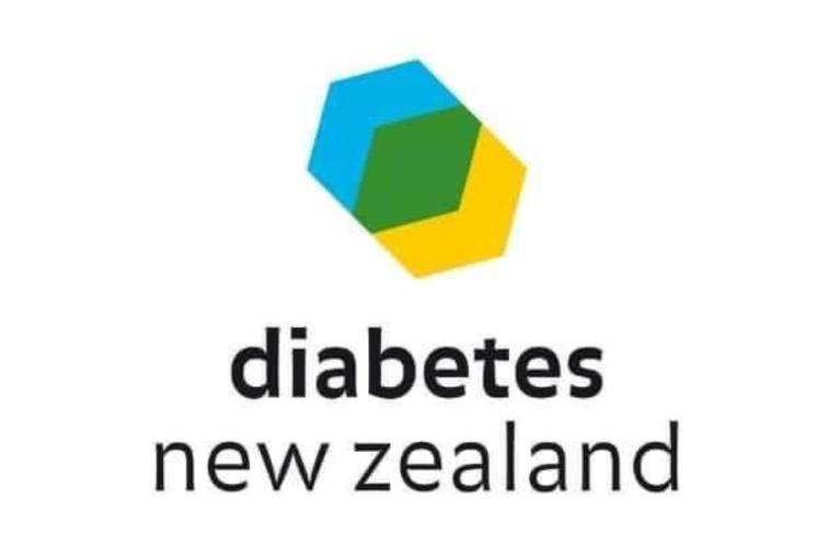 Diabetes NZ logo with two hexagons overlapping, one is blue and one is yellow and where they overlap it is green.