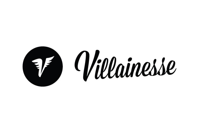 The Villainesse logo features a black circular emblem with a stylised white wing design alongside elegant script typography spelling "Villainesse" in black.