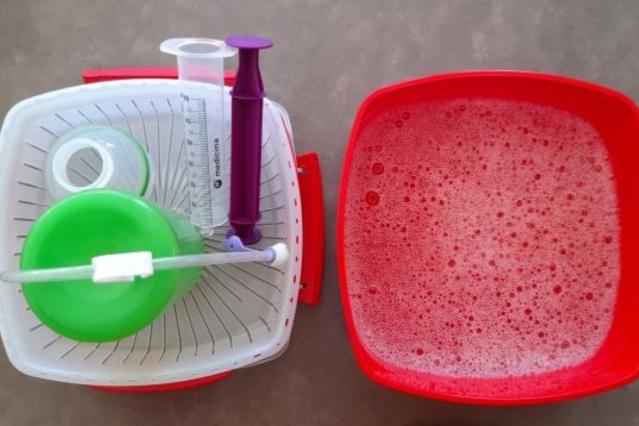 Photo of tube feeding equipment being washed