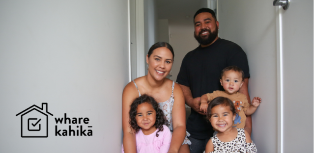 Photo of a family in their home