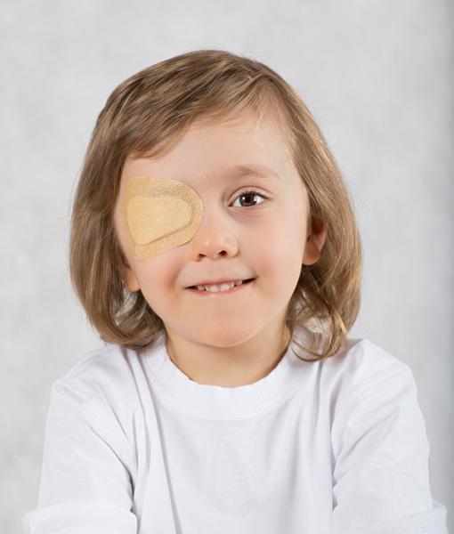 Girl with a patch on her eye