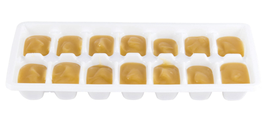 Ice cube tray filled with pureed baby food
