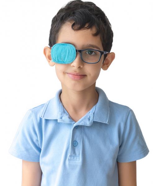 Boy with glasses and a patch over one lens
