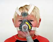 Child with CPAP mask