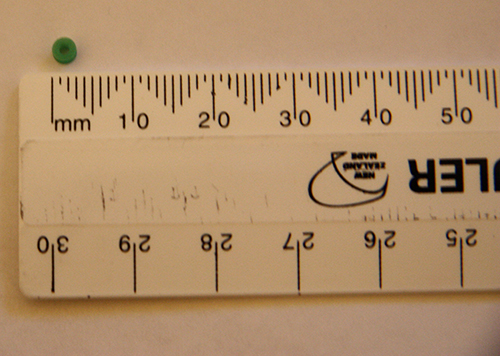 Grommet against a millimetre ruler
