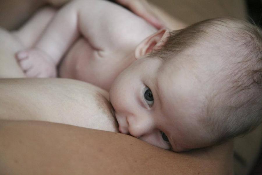 Close up of baby breastfeeding 